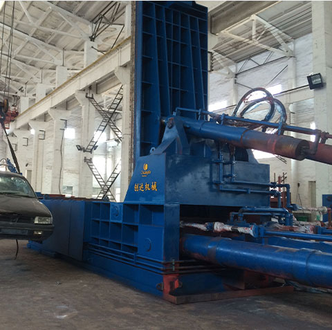 Scrap car baler